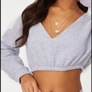 Off the shoulder grey sweater